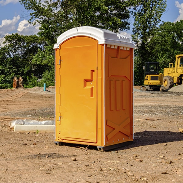 how often are the portable restrooms cleaned and serviced during a rental period in Powhattan KS